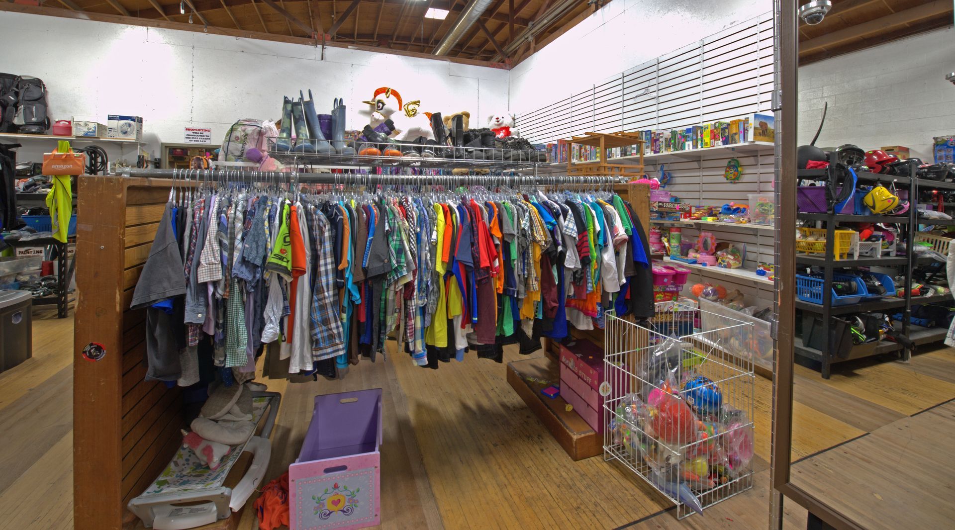 A store filled with lots of clothes and toys.