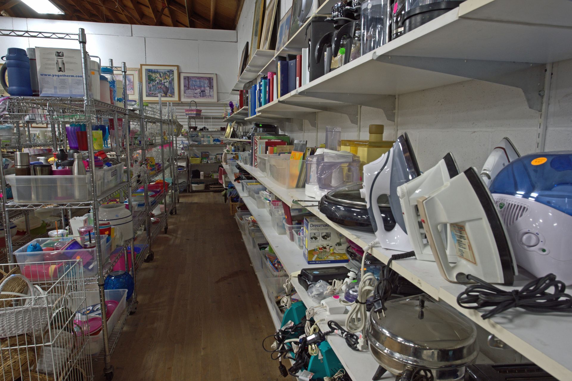 A store filled with shelves filled with lots of appliances.
