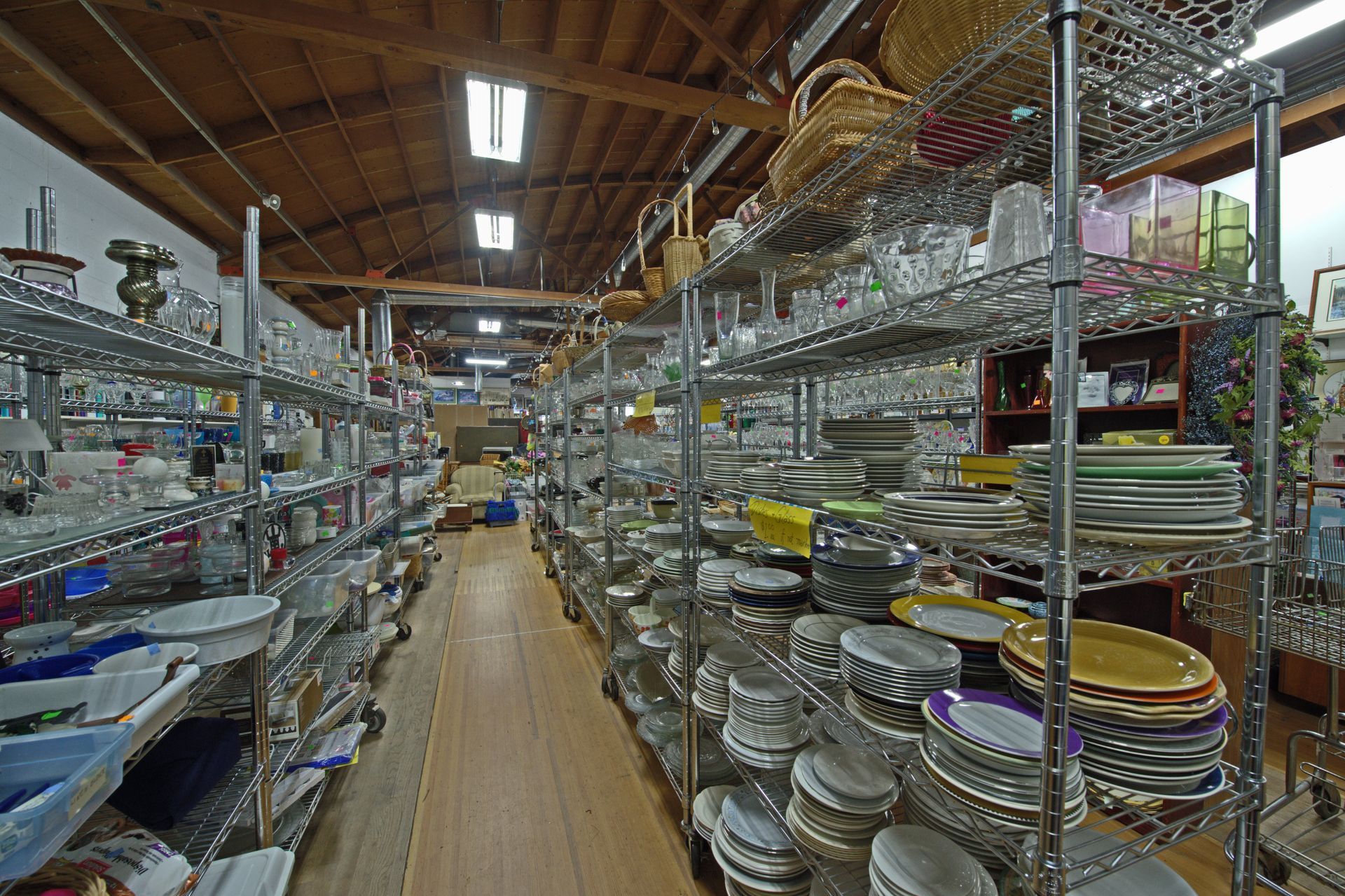 A warehouse filled with lots of plates and bowls