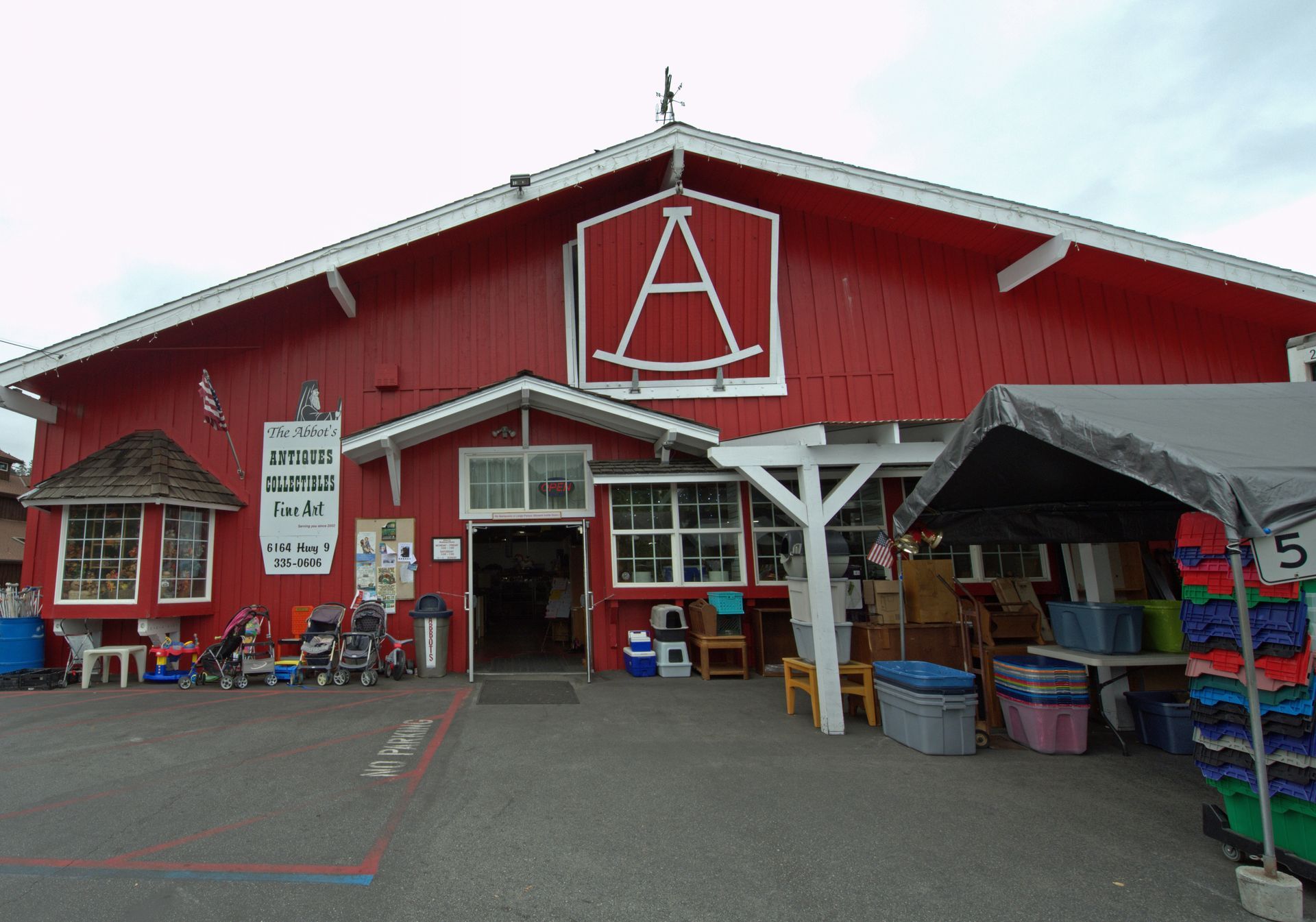 A red barn with the letter a on it