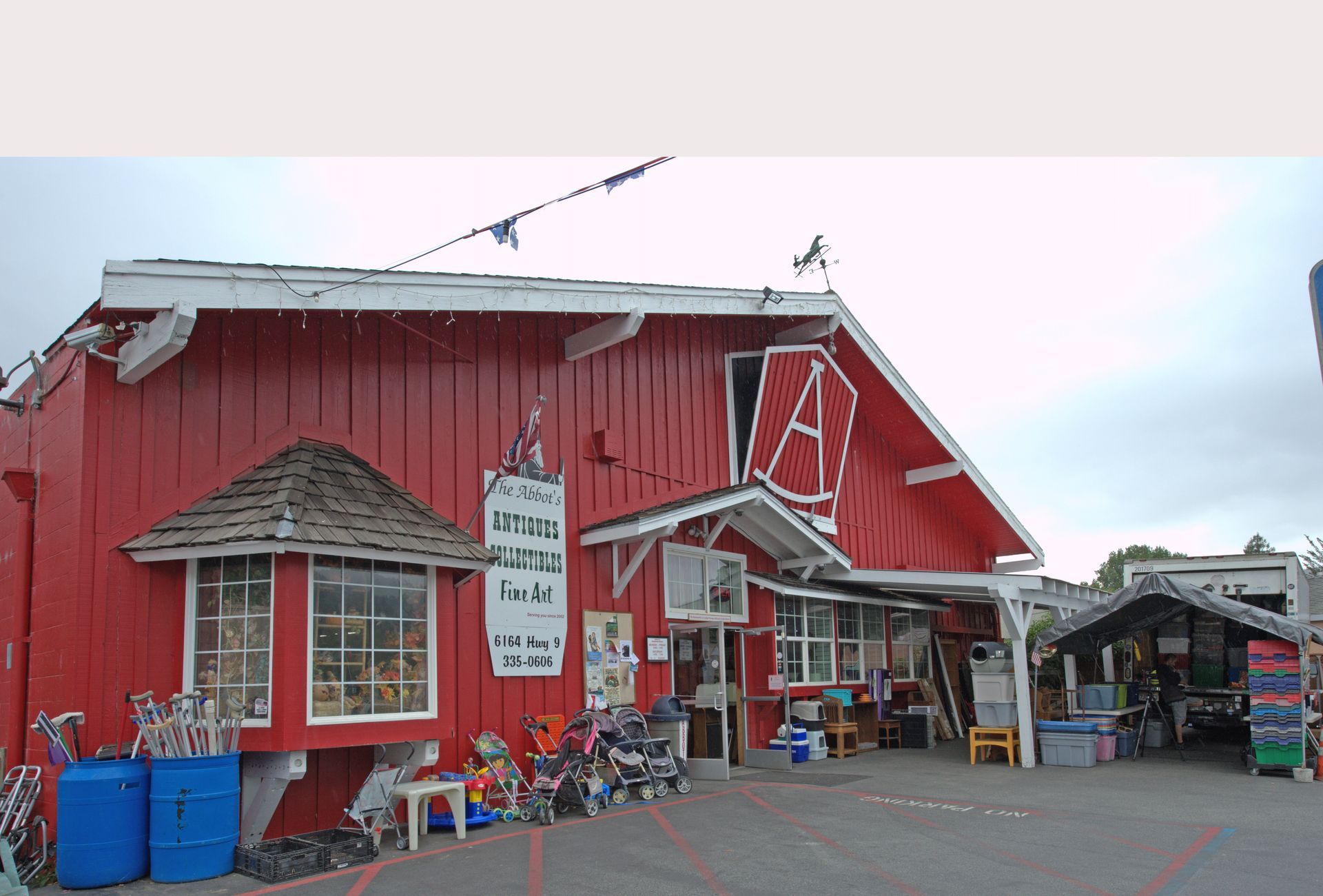A red barn with the letter a on it
