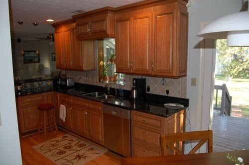 Kitchen With Wood Cabinets — kitchen remodeling services in Newport News, VA