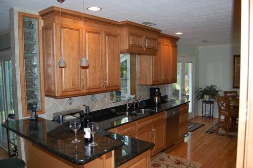 Wooden Counters With Black Tops — kitchen remodeling services in Newport News, VA