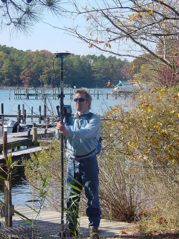 Man with Surveyor's Rod — Richmond, VA — Engineering Design Associates