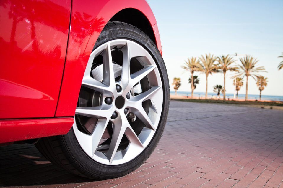 A Close Up Of A Red Car's — Headland Auto Servicing & Air Conditioning In Alexandra Headland, QLD