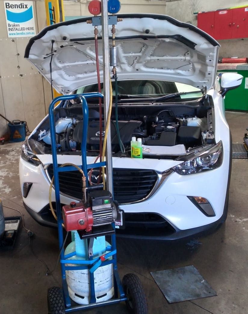 A White Car With The Hood Up Is Being Worked On — Headland Auto Servicing & Air Conditioning In Alexandra Headland, QLD