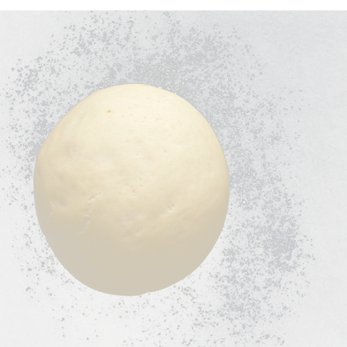 risen yeast dough with flour dust around it