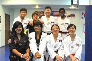 Irvine Karate Programs — Group Of Teens Portrait After Taekwondo Class in Pkwy Irvine, CA