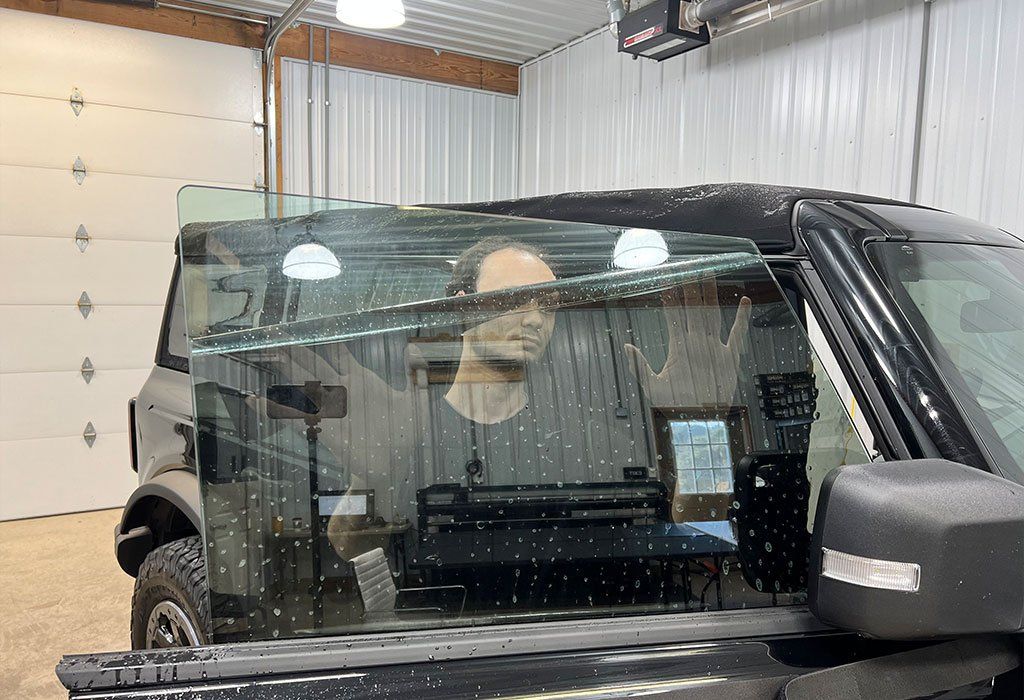 man testing window tint