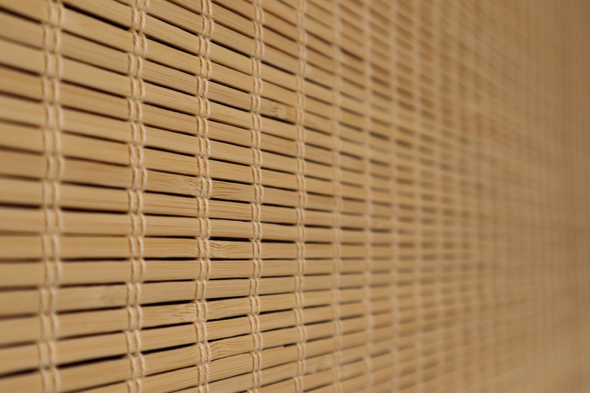 A woven wood shade on a window at The Blind Guy near Kalispell, MT