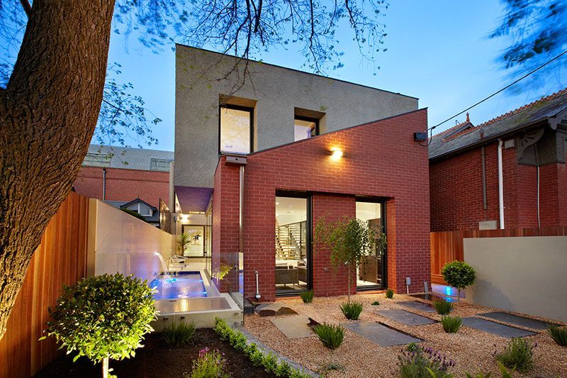 A Brick House With a Pool in the Backyard — Leemark Design Services In Parramatta Park, QLD