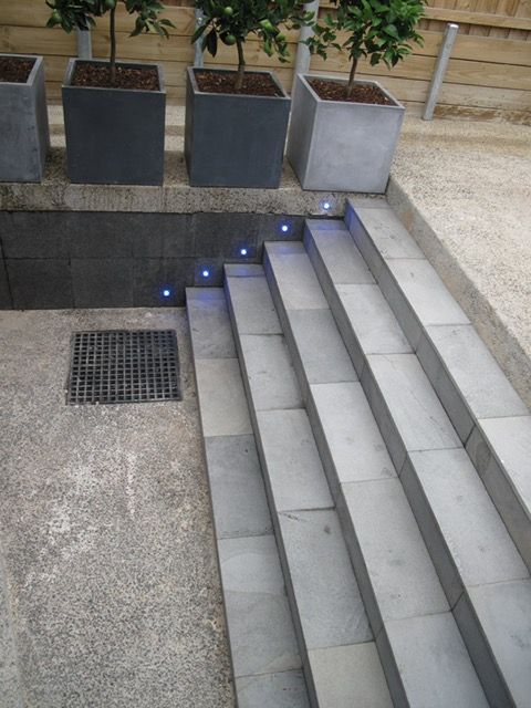 A Set of Stairs With Blue Lights on Them — Leemark Design Services In Parramatta Park, QLD
