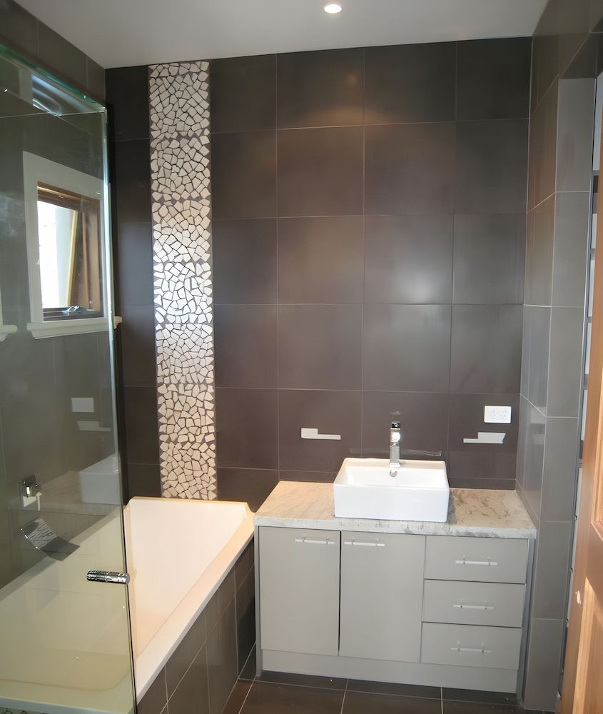 A Bathroom With a Sink and a Bathtub — Leemark Design Services In Smithfield, QLD