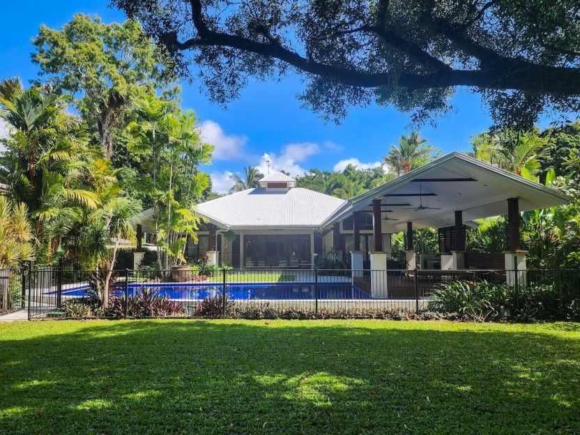 A Large House With a Swimming Pool in the Backyard — Leemark Design Services In Parramatta Park, QLD