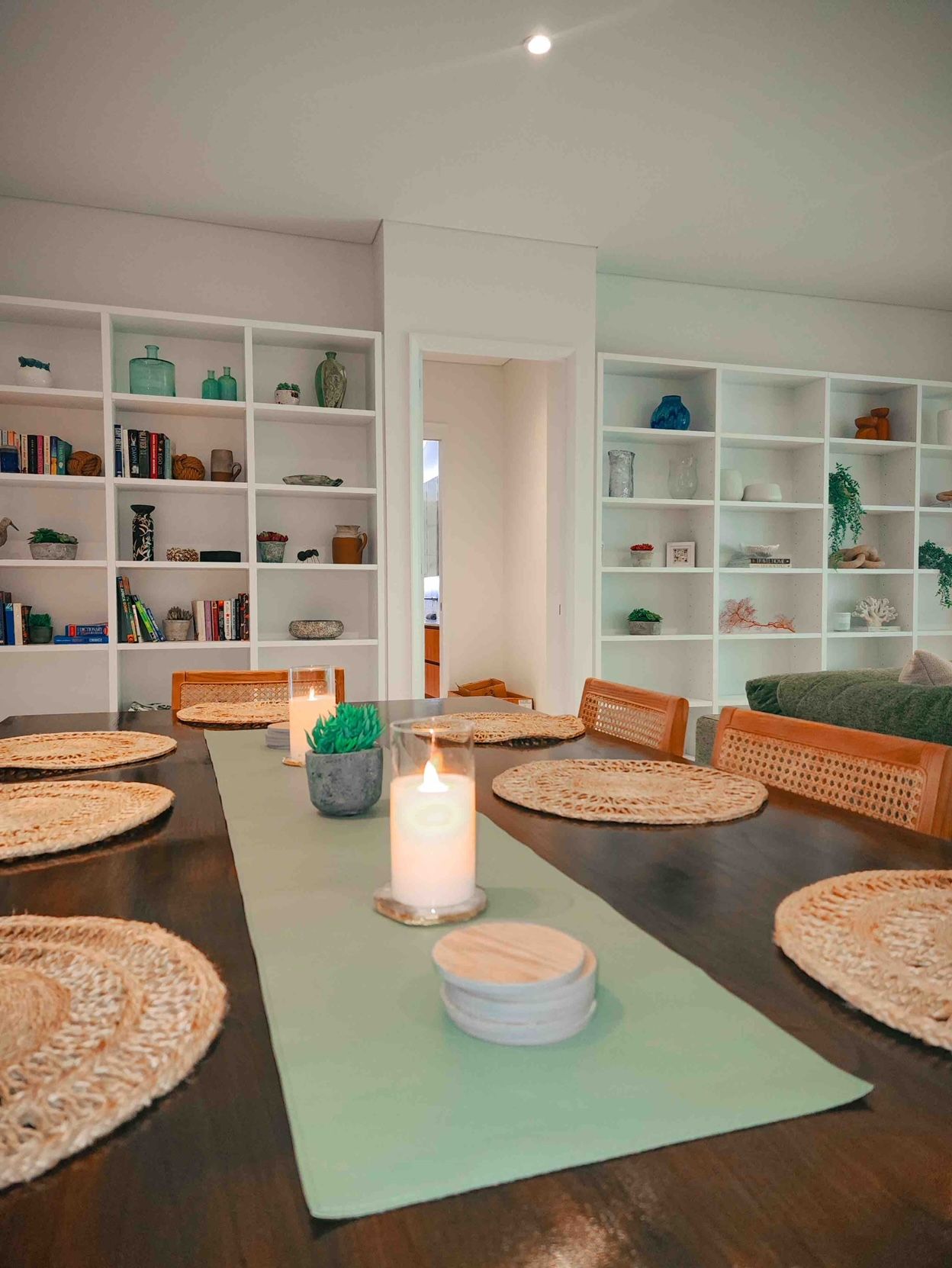 A Dining Room Table With a Green Table Runner and Candles on It — Leemark Design Services In Parramatta Park, QLD