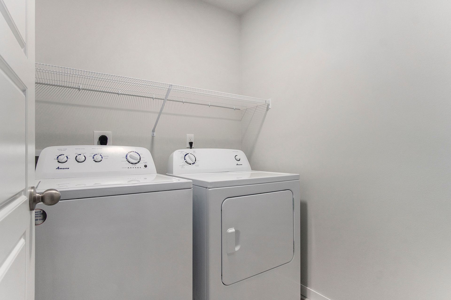 Laundry room with washer and dryer.