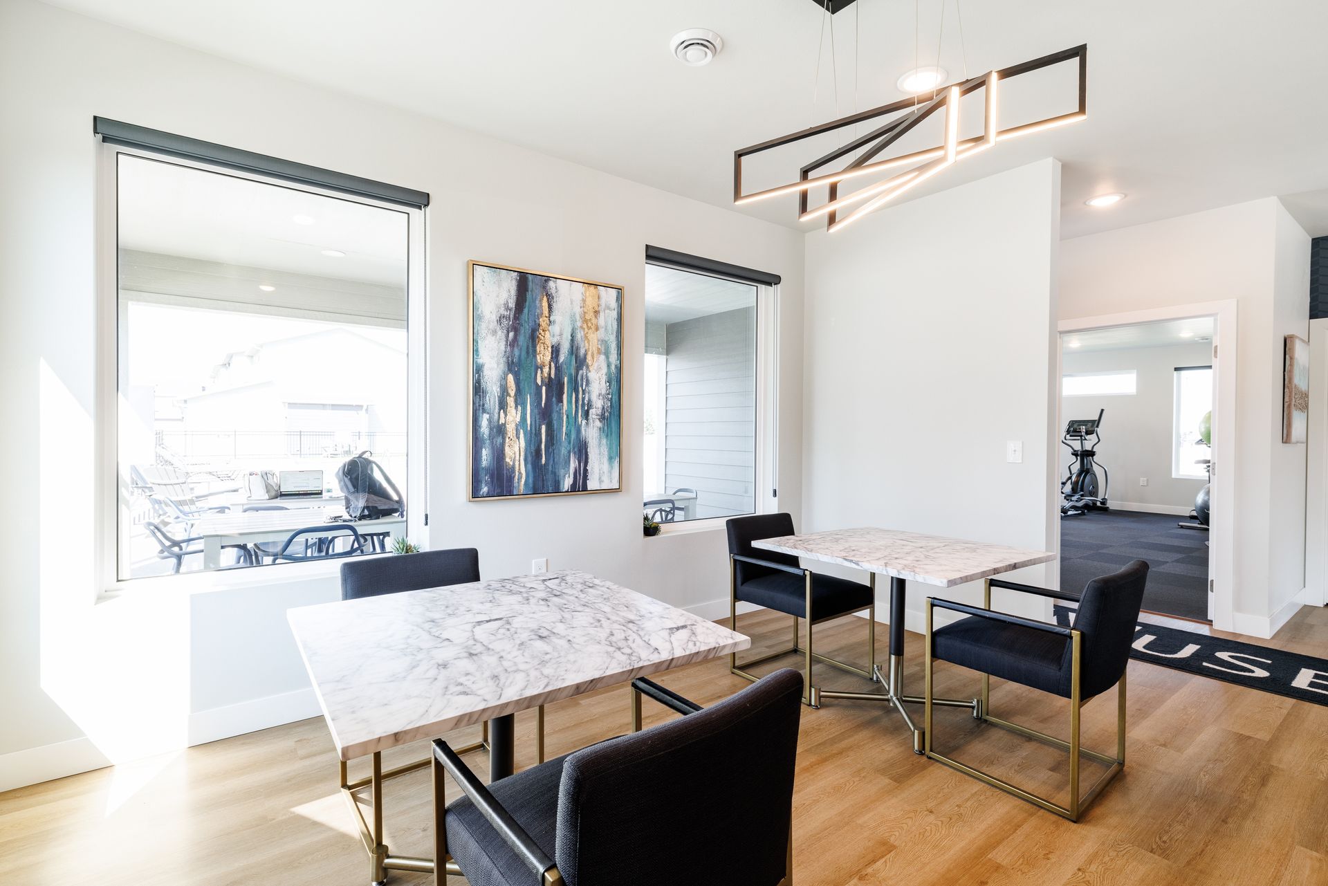 Tables and chairs in the clubhouse.