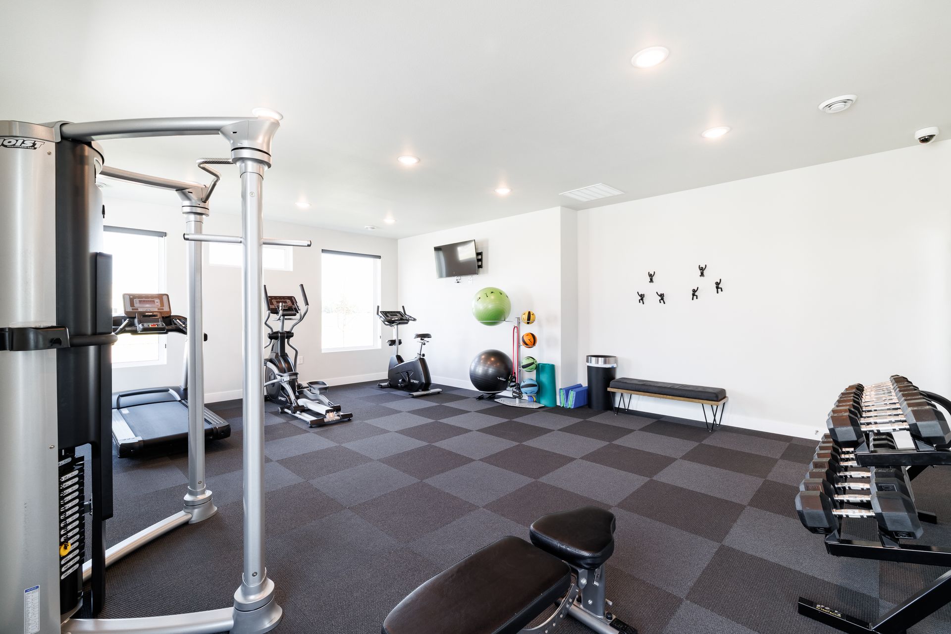 Gym with fitness equipment.