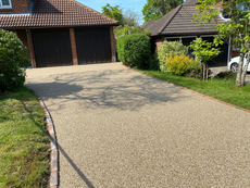 A pile of gravel is sitting on the ground.