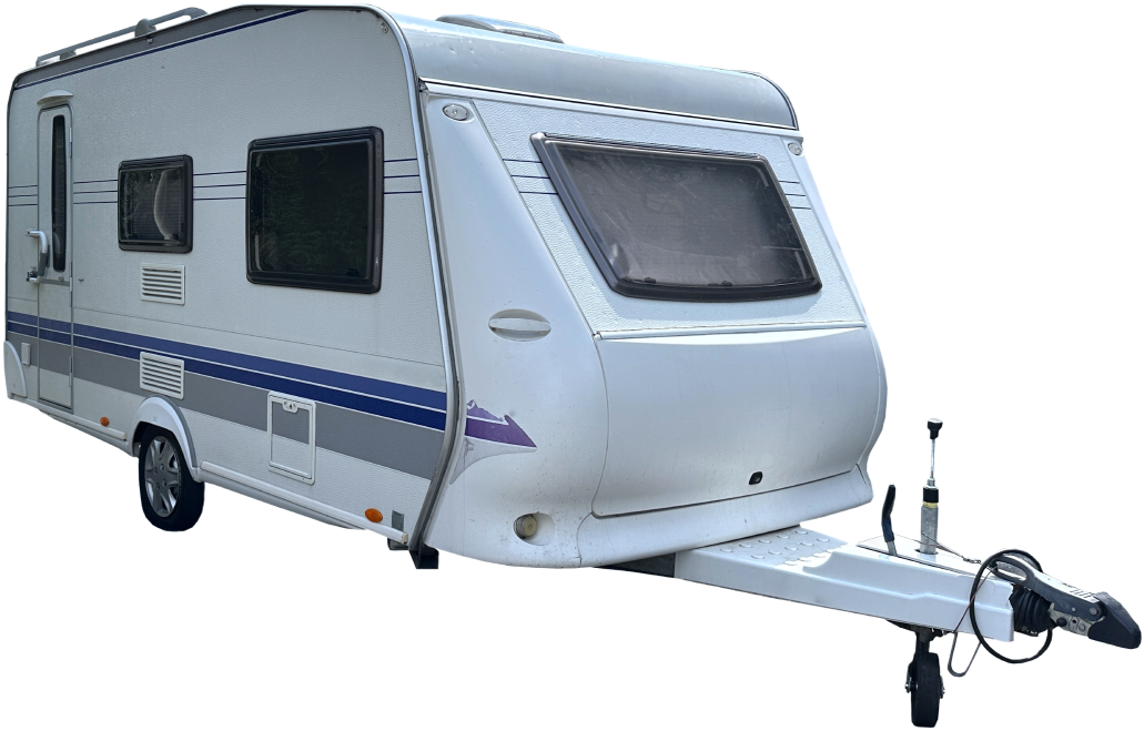 White and gray travel trailer with a blue stripe, hitched to a tow vehicle.