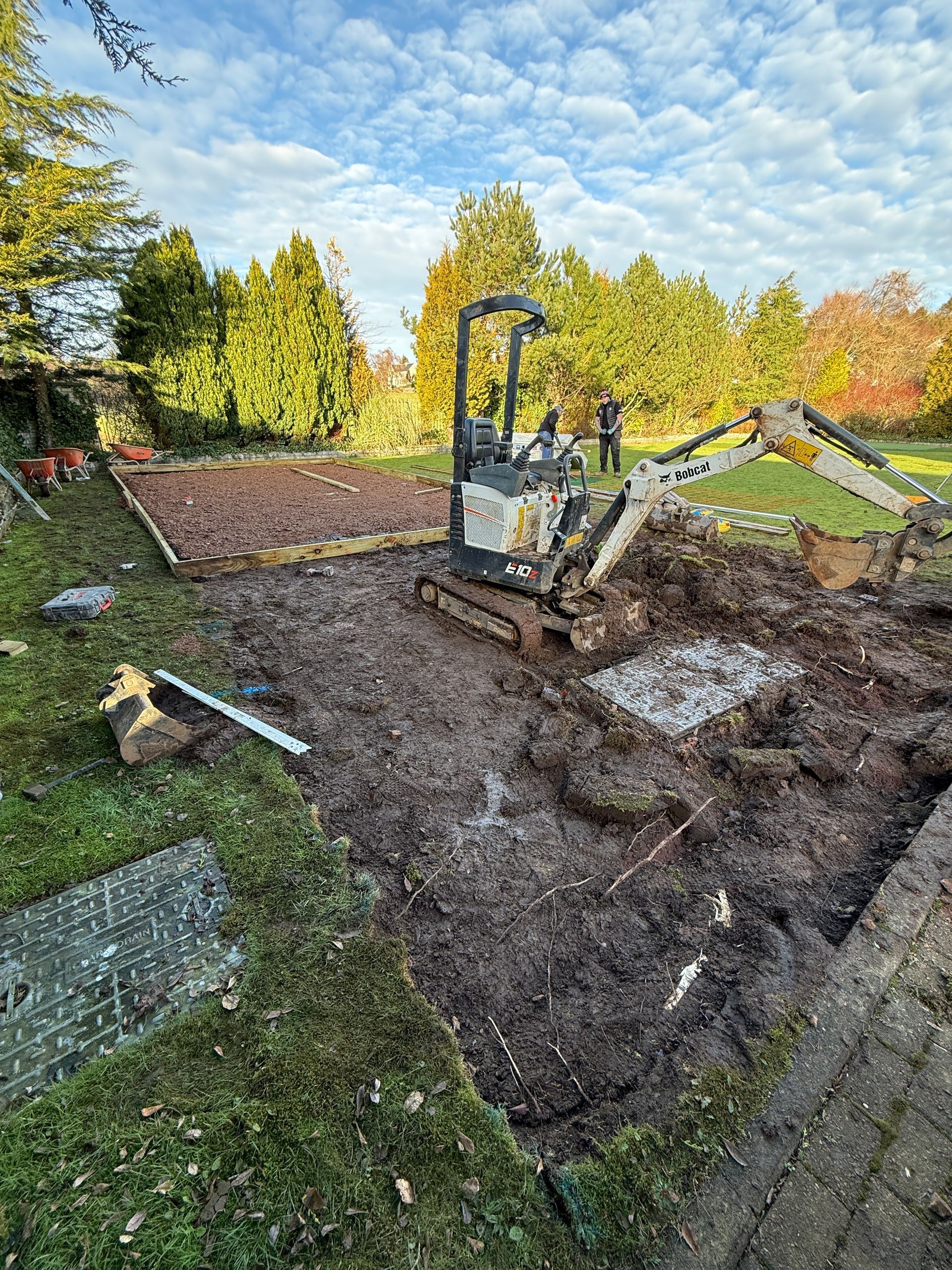 Sub-base and groundwork preparation for patio and retaining wall installation in Central Scotland