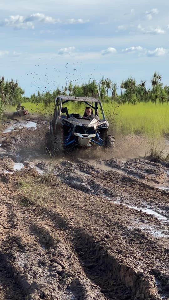 Woman driving buggy - Parts & Servicing In Yarrawonga, NT