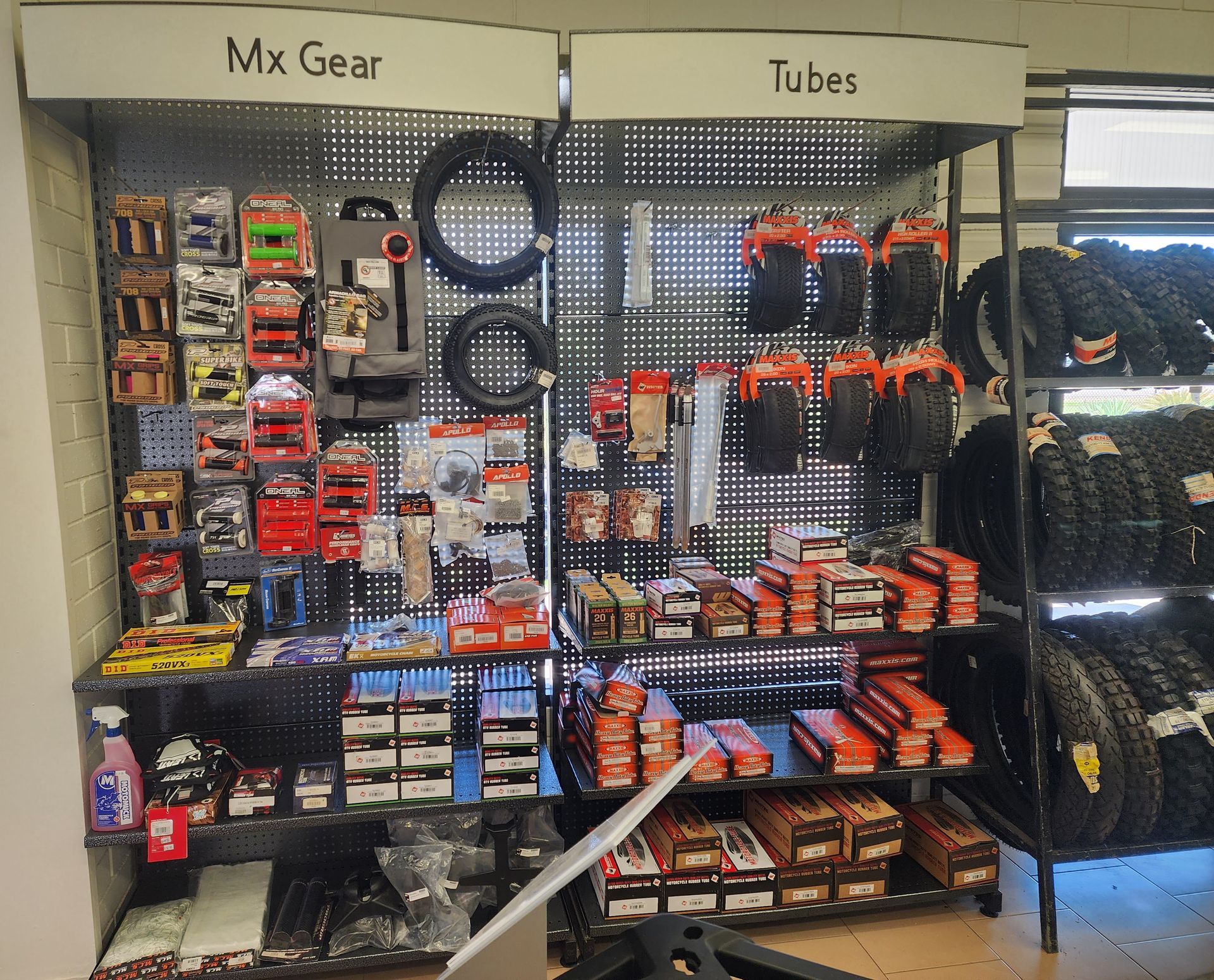 A display of mx gear and tubes in a store