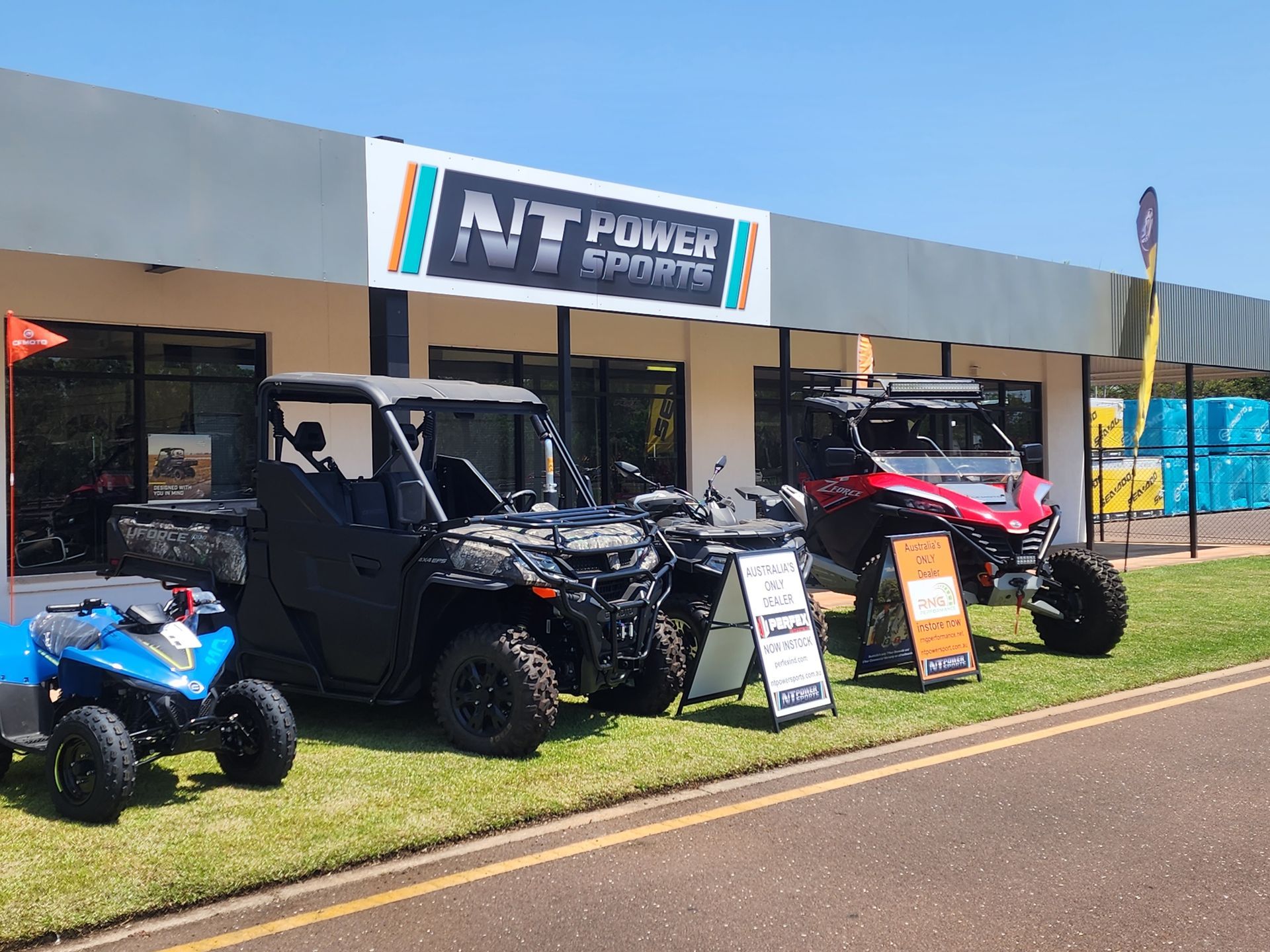 A row of atvs parked in front of a building.
