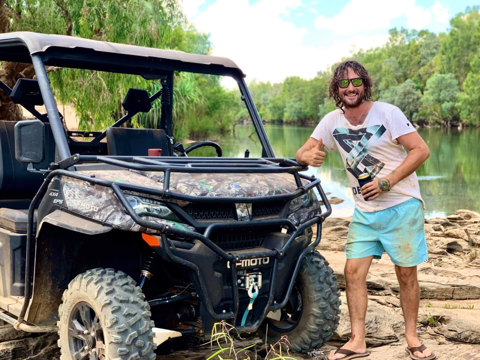 Man next to buggy - Parts & Servicing In Yarrawonga, NT