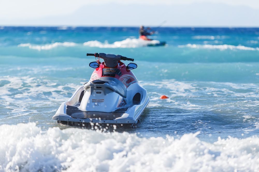 Jet ski Floating on Sea - Evinrude Outboard Motor In Arnhem Land, NT