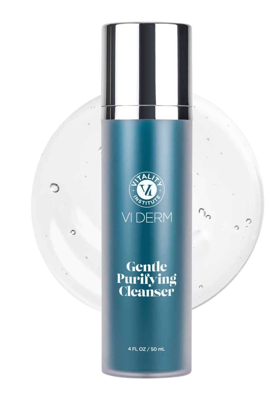 VI Derm Gentle Purifying Cleanser bottle, teal with silver cap, set against a circular gel swatch.