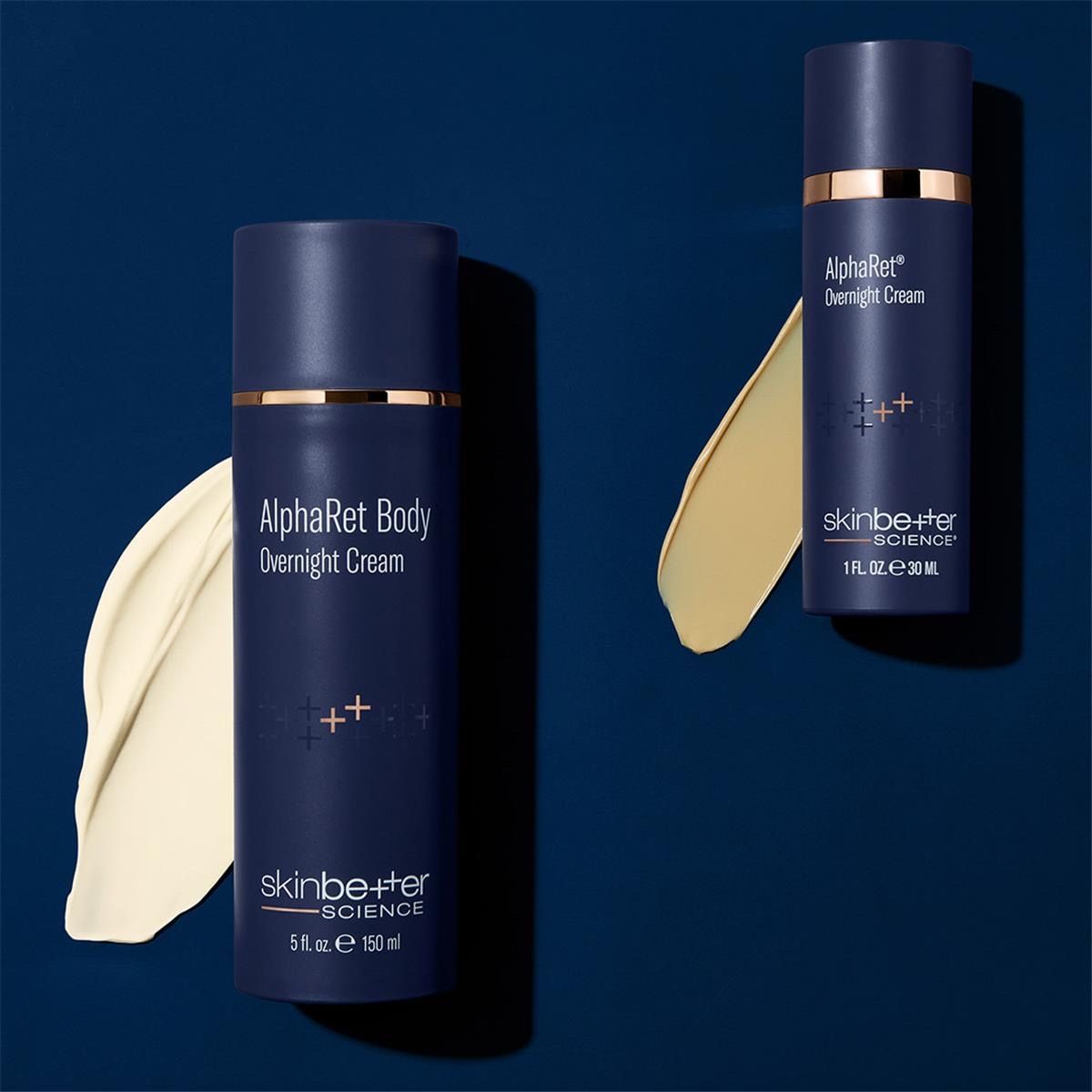 Two skincare bottles, navy blue with gold accents, on dark blue. Cream swatches alongside.