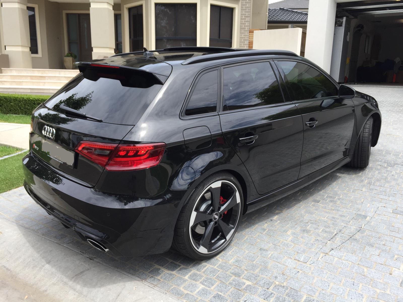 Ceramic tint a black Audi rear view