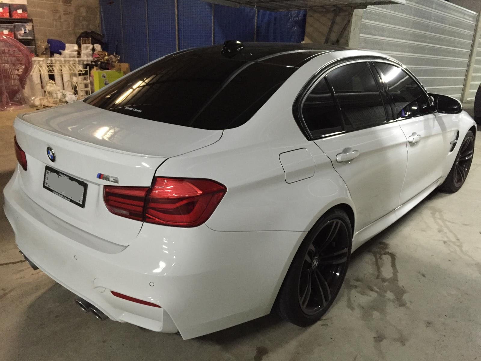 Ceramic tint a white BMW rear view