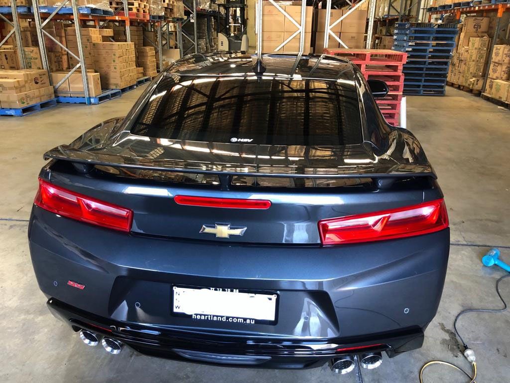 Ceramic tint a black Chevrolet rear side view