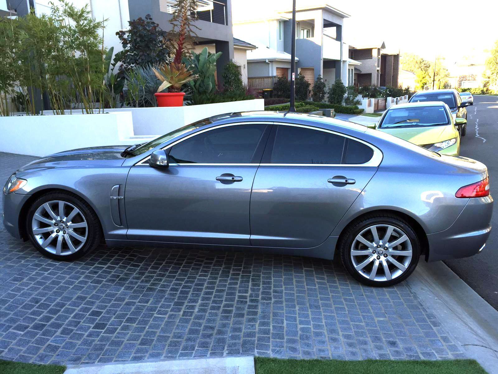 Ceramic tint a grey Mercedes luxury side view