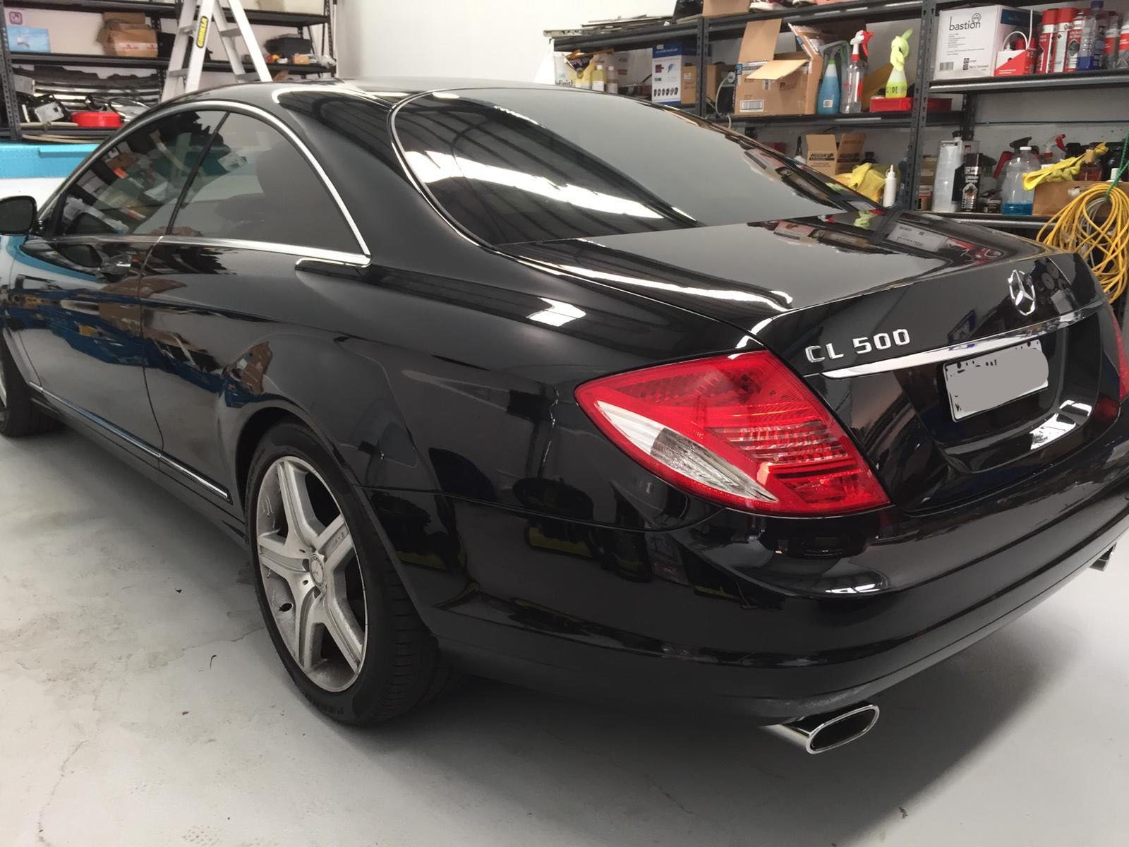 Ceramic tint a black Mercedes luxury rear view