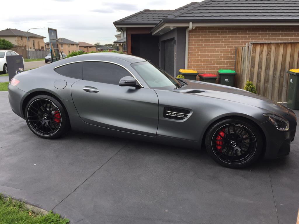 Ceramic tint a grey Mercedes sports side view