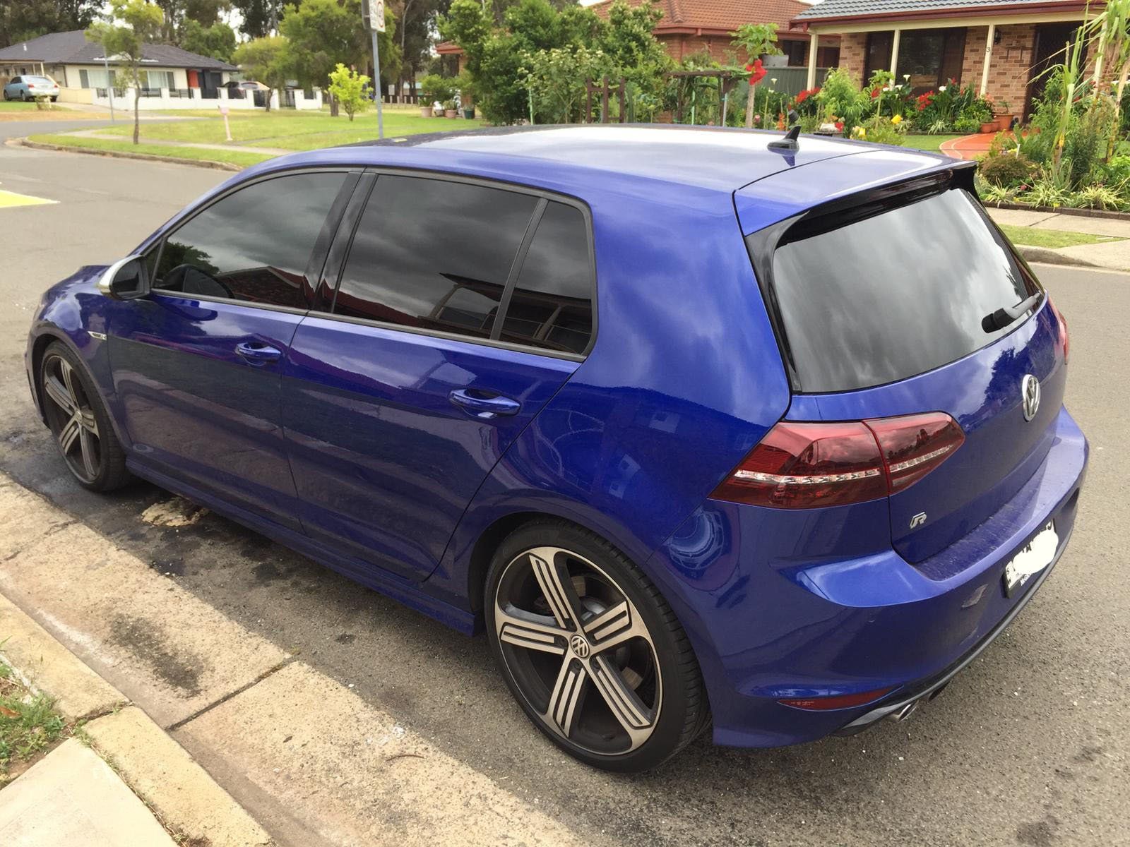 Car tint a blue VW Golf side view