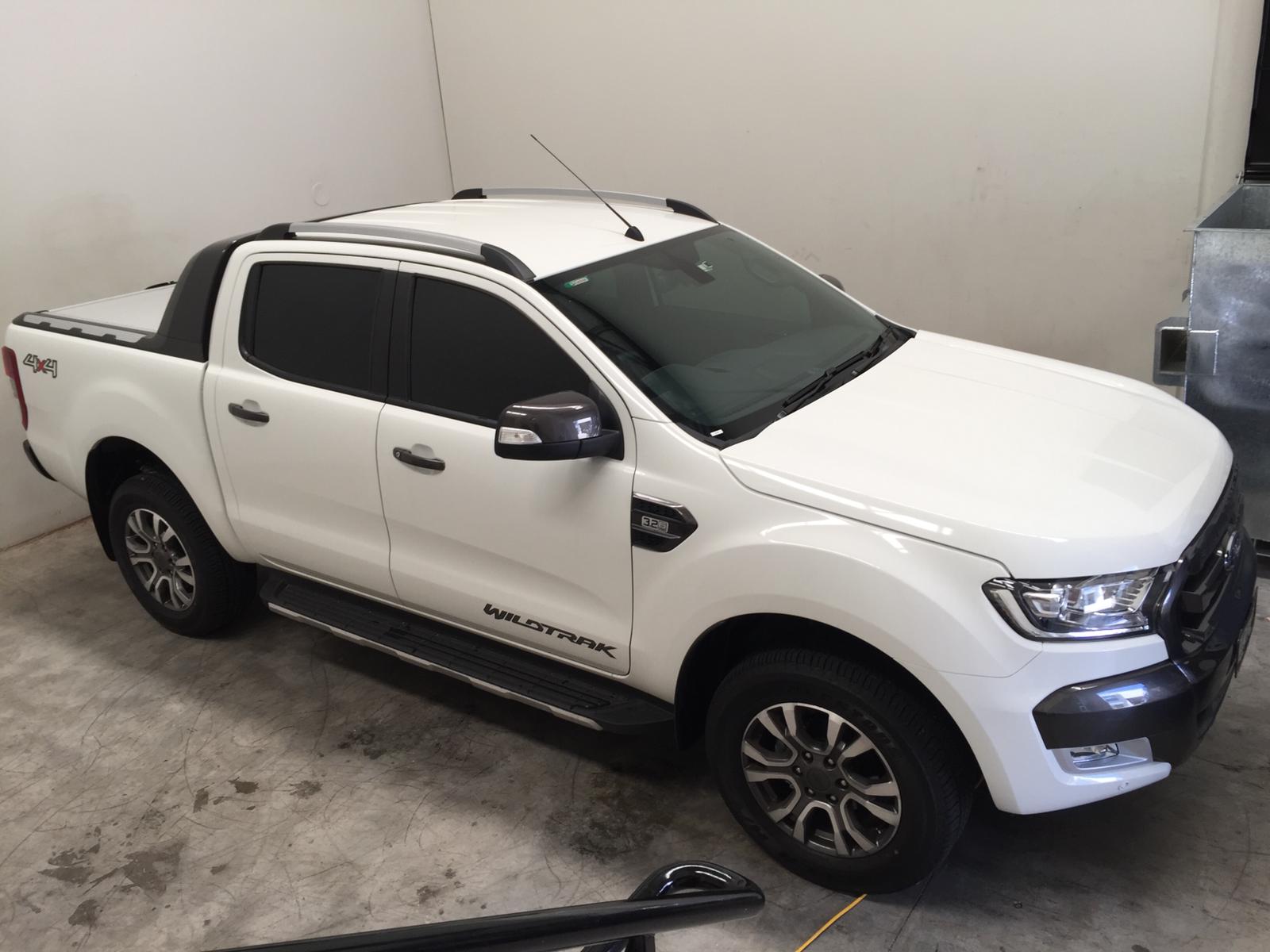 Car tint a white 4x4 wildtrack