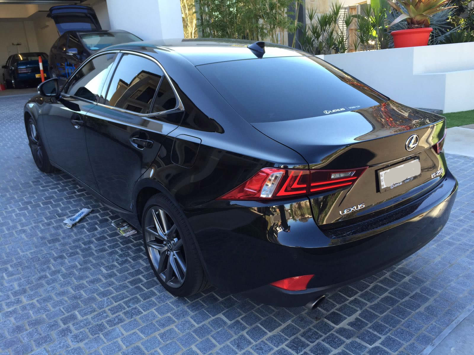 car tinting a Lexus rear view