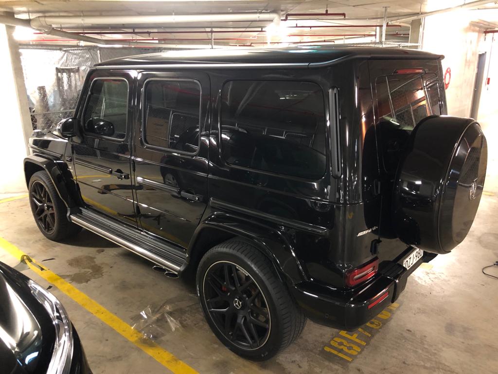 Car tint a black Mercedes 4x4 rear side view