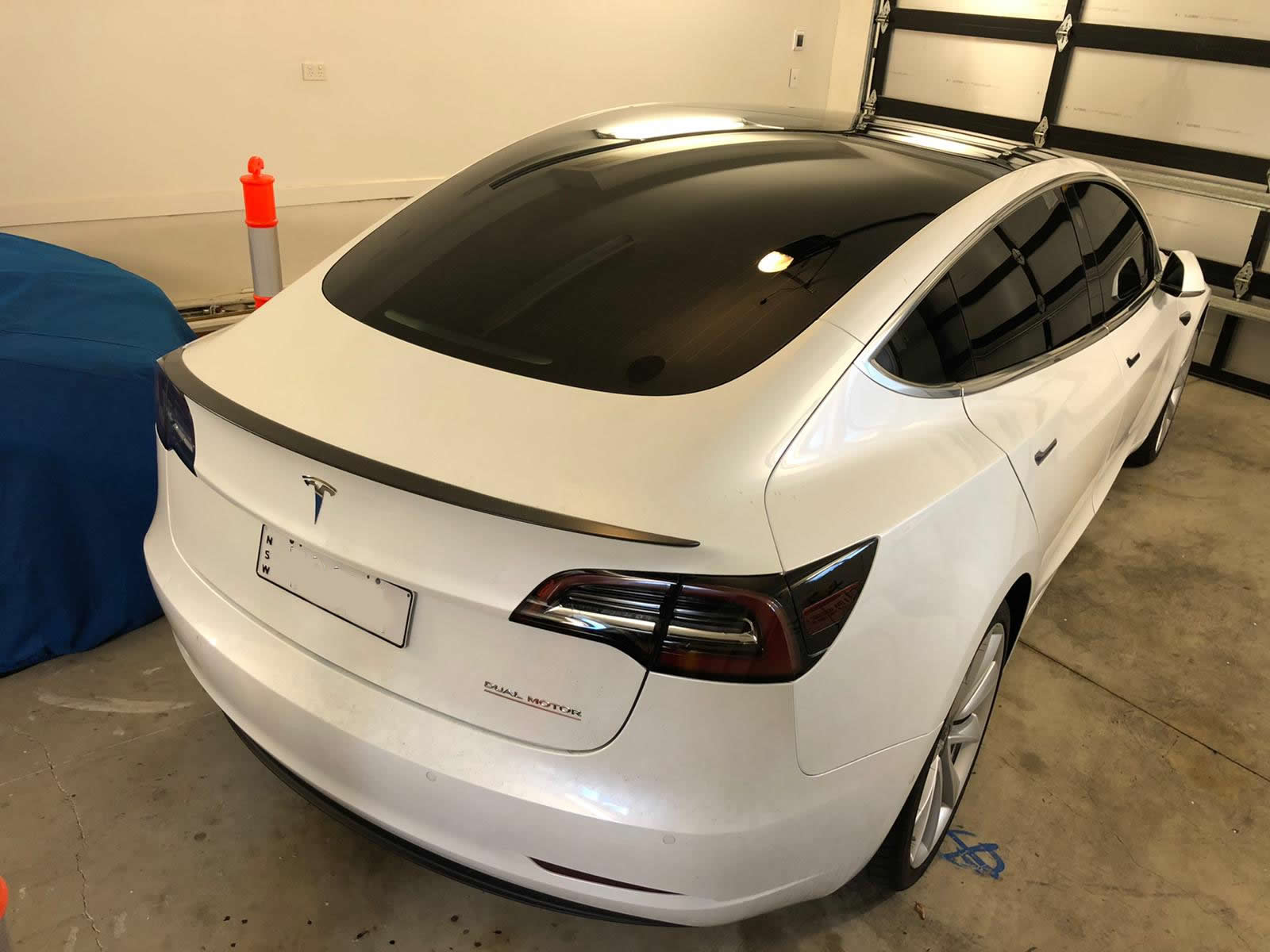 Tint a white Tesla rear view
