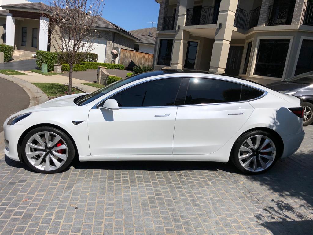 Tint a white Tesla side view