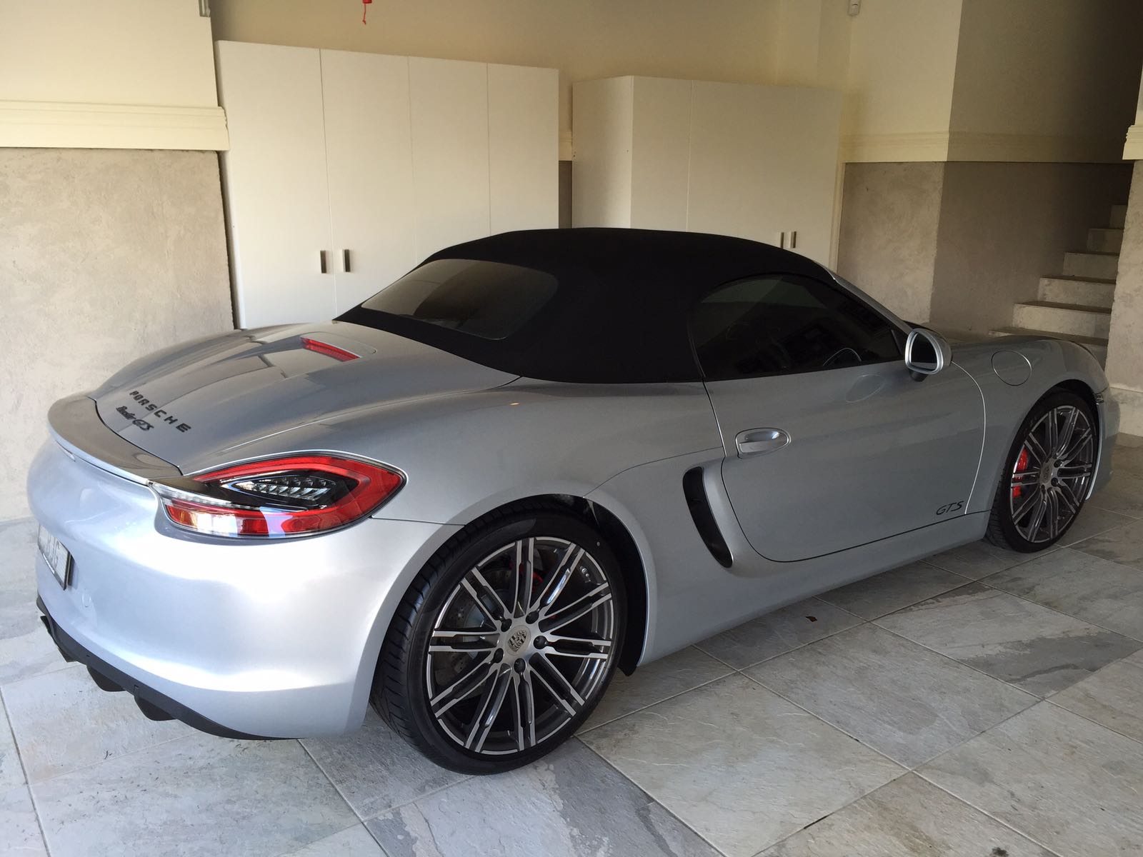 Car tint a silver Porsche rear view