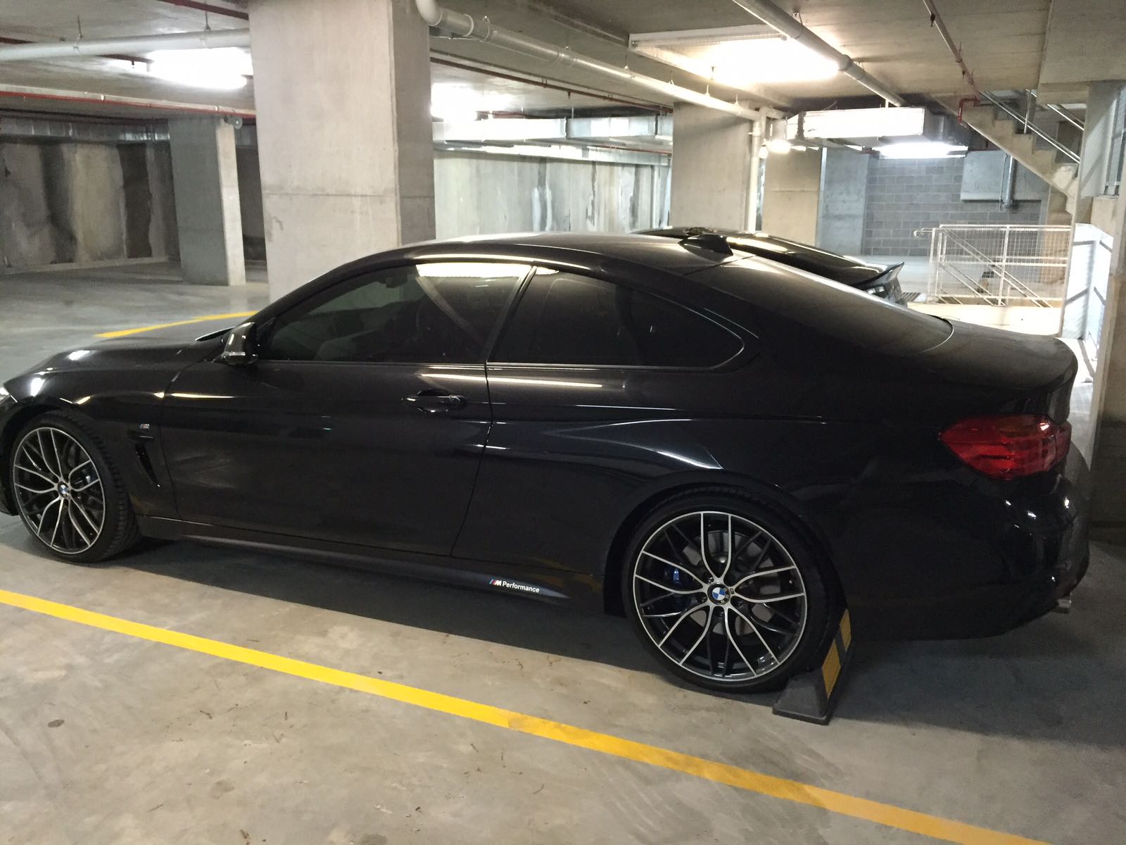 car tinting a sports car side view