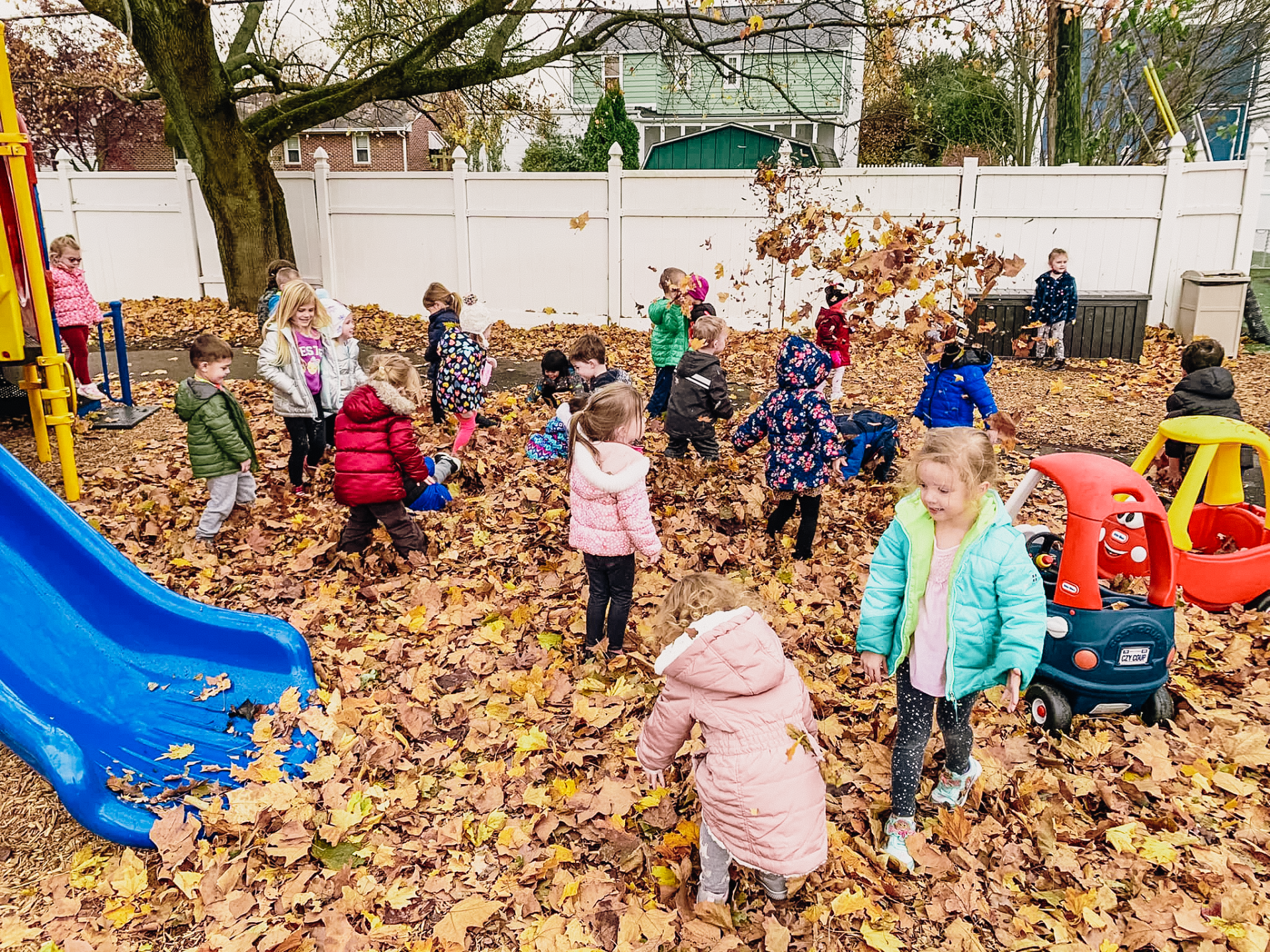 Graceway Children Academy - Kids Playing With Leaves