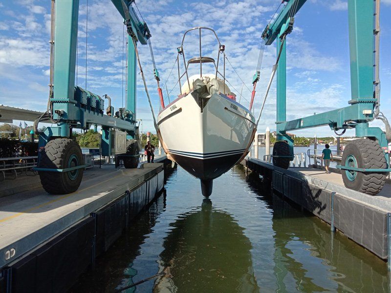 Boat In Travel Lift Pen — Local Marine Repair Experts in Coomera, QLD