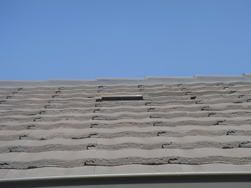 A Close Up of a Roof With a Blue Sky in the Background — Vent Wise in Twin Waters, QLD