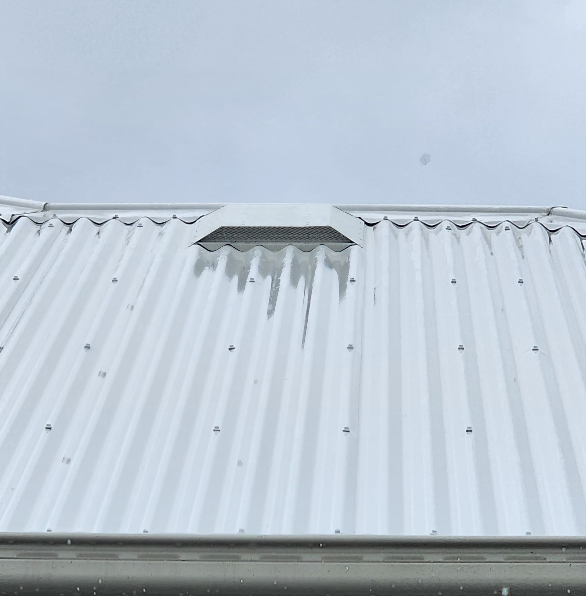 A Room Under Construction With a Wooden Ceiling and Walls — Vent Wise in Twin Waters, QLD